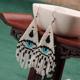 Western Devils Eye Braided Tassel Earrings