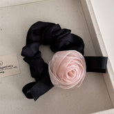 PURE DESIRE PEARLESCENT PINK ROSE BOW HAIRBAND_CWAHA4688