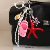 MINI CLOG KEYCHAIN WITH STARFISH BAG CHARM_CWMM7557