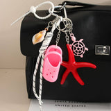 MINI CLOG KEYCHAIN WITH STARFISH BAG CHARM_CWMM7557