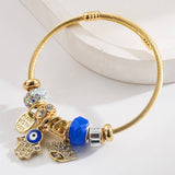 ADJUSTABLE EVIL EYE BRACELET WITH LETTER CHARM_CWMM8568