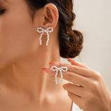 BOW FRENCH TASSEL PEARL EARRINGS_CWAJE1156