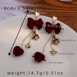 NEW BURGUNDY BOW LONG HEART EARRINGS_CWAJE1860