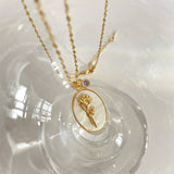DECEMBER THREE DIMENSIONAL FLORAL OVAL NECKLACE_CWAJE1614