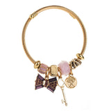 GOLD CRYSTAL BOW CHARM BRACELET FOR WOMEN_CWMM8471