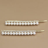 A PAIR OF ELEGANT PEARL AND RHINESTONE HAIR PIN_CWAHA1232