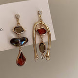 ASYMMETRIC DIAMOND AND CRYSTAL PALM EARRINGS_CWAJE2318