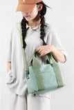 SIMPLE SQUARE HANDLE CANVAS CROSS BODY BAG