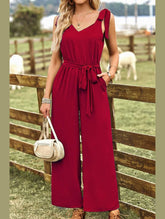 V NECK TIED WAIST RIBBON STRAP WIDE JUMPSUIT - Doublju