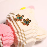 RETRO EXAGGERATED BUTTERFLY ELEMENT EARRINGS_CWMM5517