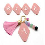 LETTER ACRYLIC KEYCHAIN WITH GEOMETRIC CHARM_CWMM7023