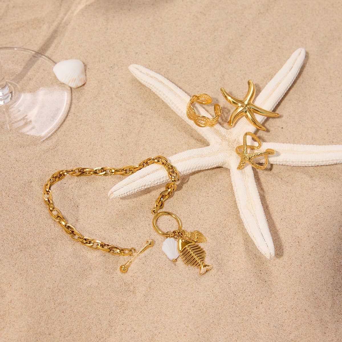 FISHBONE SHELL CHARM BRACELET 18K GOLD STEEL_CWAJE4752