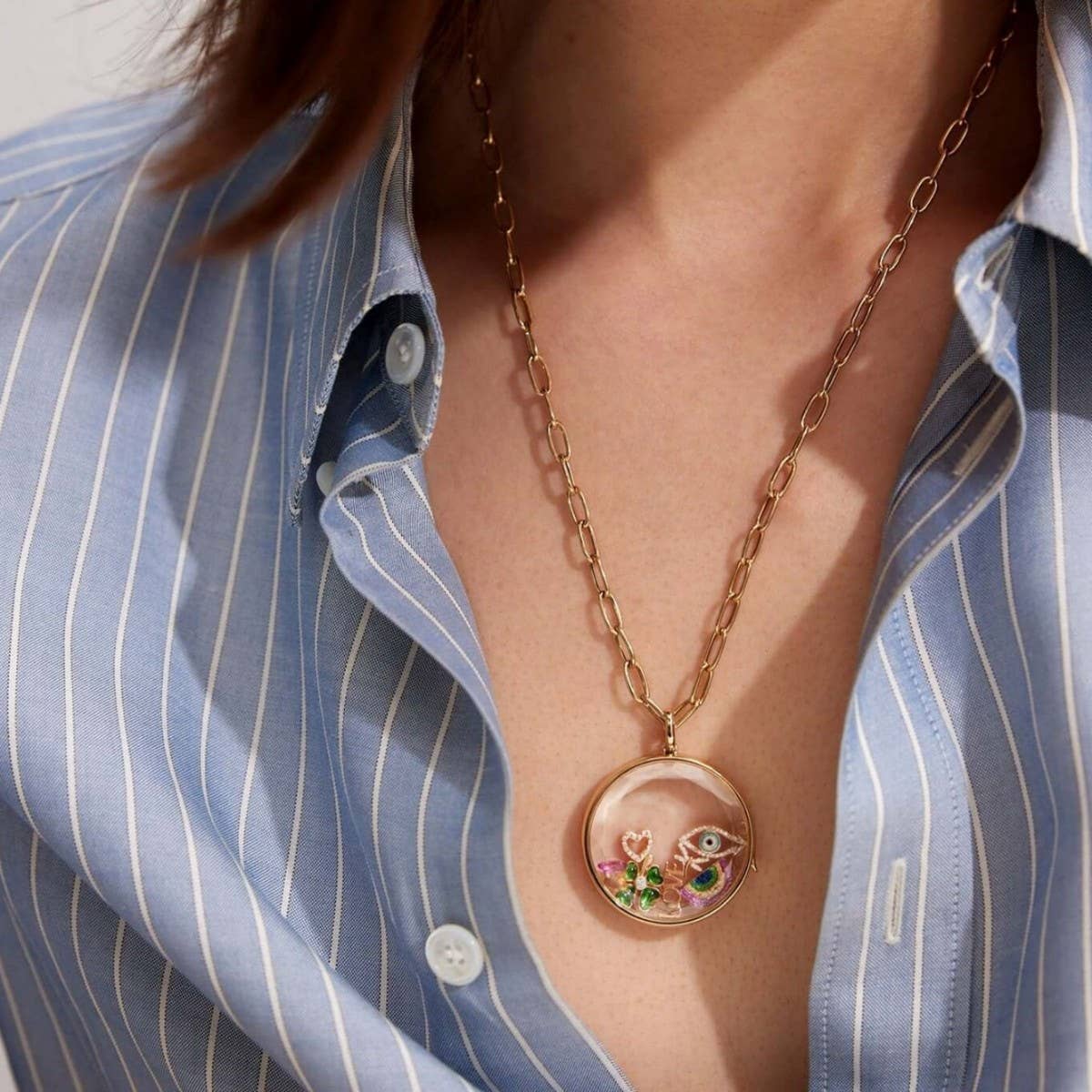 CRYSTAL HEART LOCKET NECKLACE WITH SUN FLOWERS_CWMM6952