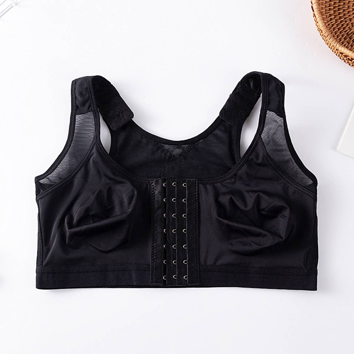 SPORTS BRA WITHOUT CHEST PAD ON FRONT BUTTON_CWMU0041