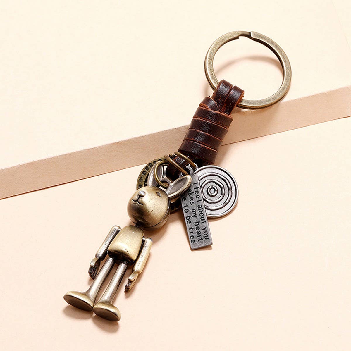 MOVABLE CARTOON ROBOT LEATHER KEYCHAIN_CWMM4709