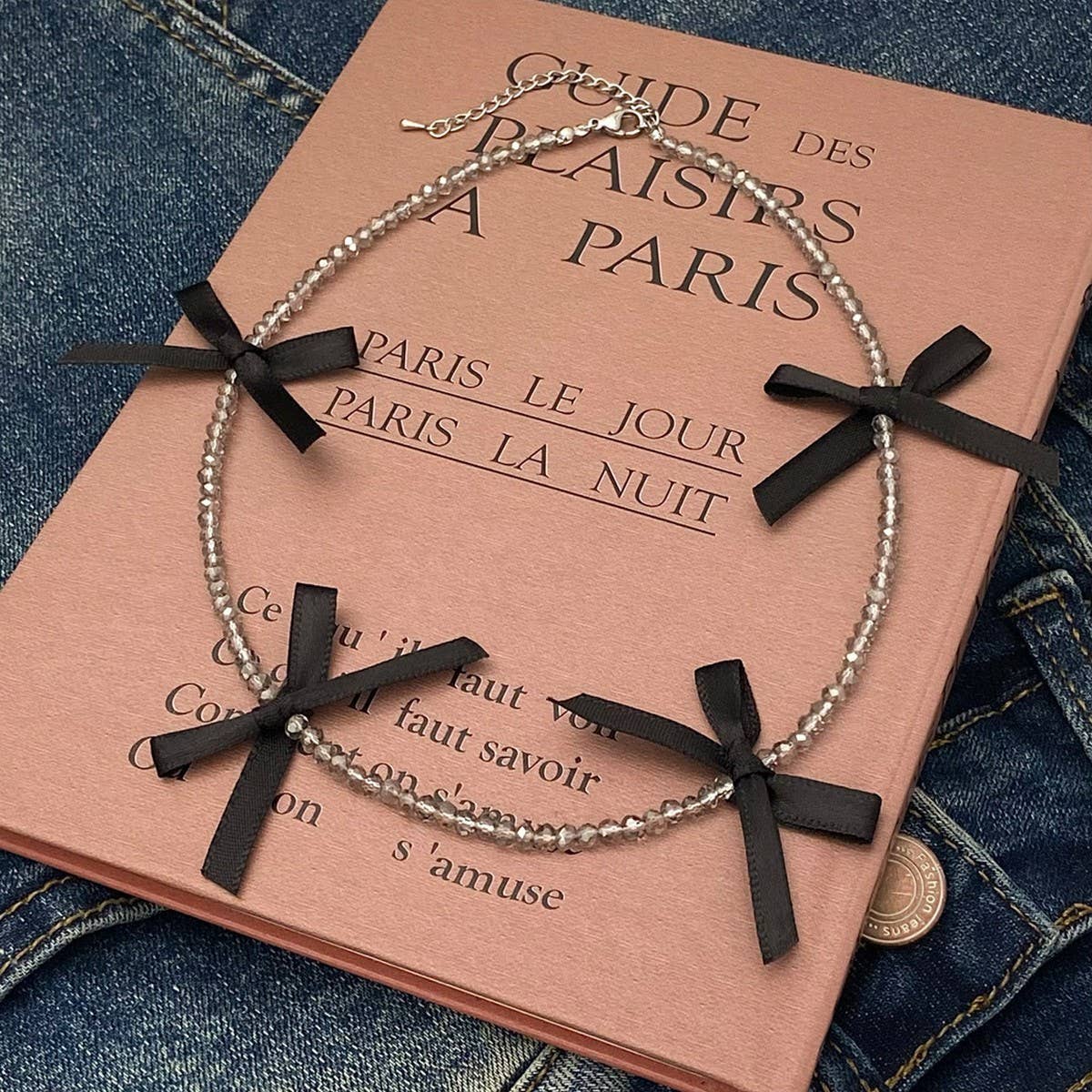 HAND WOVEN BLACK CRYSTAL BEADED BOW NECKLACE_CWAJE3075