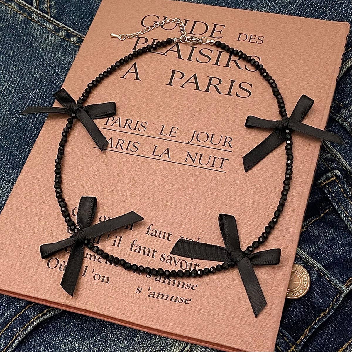 HAND WOVEN BLACK CRYSTAL BEADED BOW NECKLACE_CWAJE3075