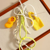 MINI HEADPHONE CASE KEYCHAIN BOW BAG CHARM_CWMM7871