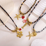 OCEAN ROPE NECKLACE WITH STARFISH FISH CHARMS_CWMM8813