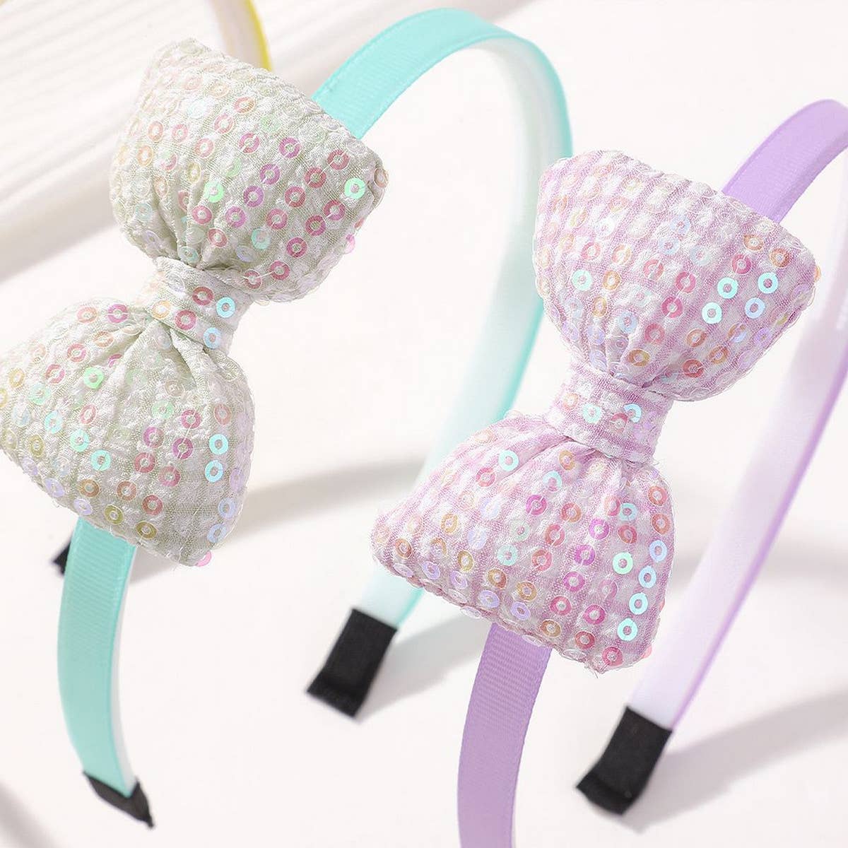 CHILDRENS BOW 3D SEQUINED HEADBAND_CWAHA2365