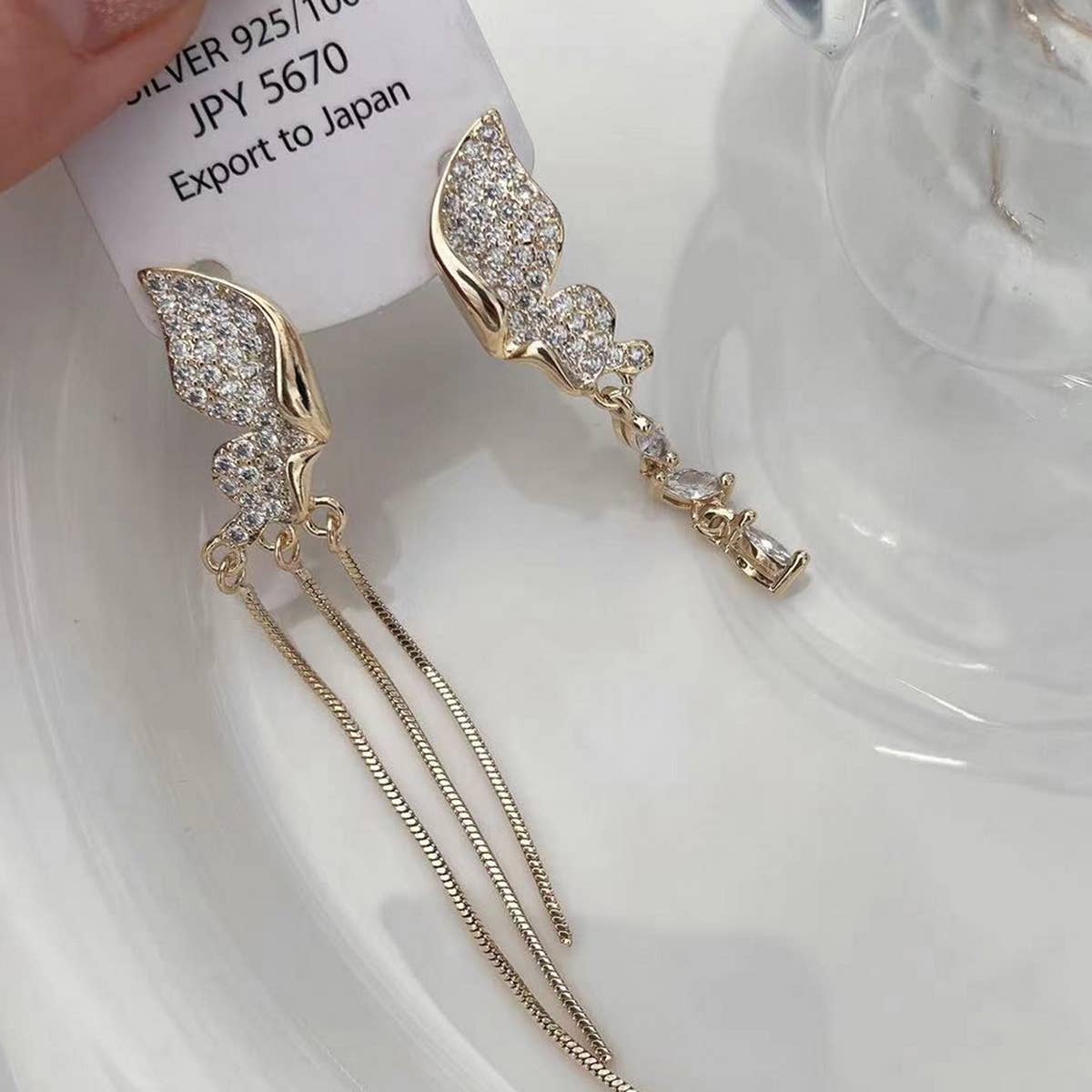 PREMIUM ASYMMETRICAL TASSEL_CWAJE1317