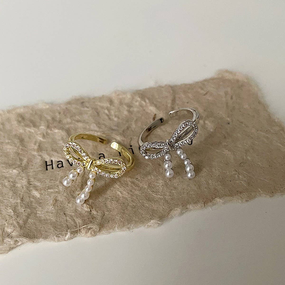 FASHIONABLE BOW SMALL PEARL RING FOR WOMEN_CWAJE3096