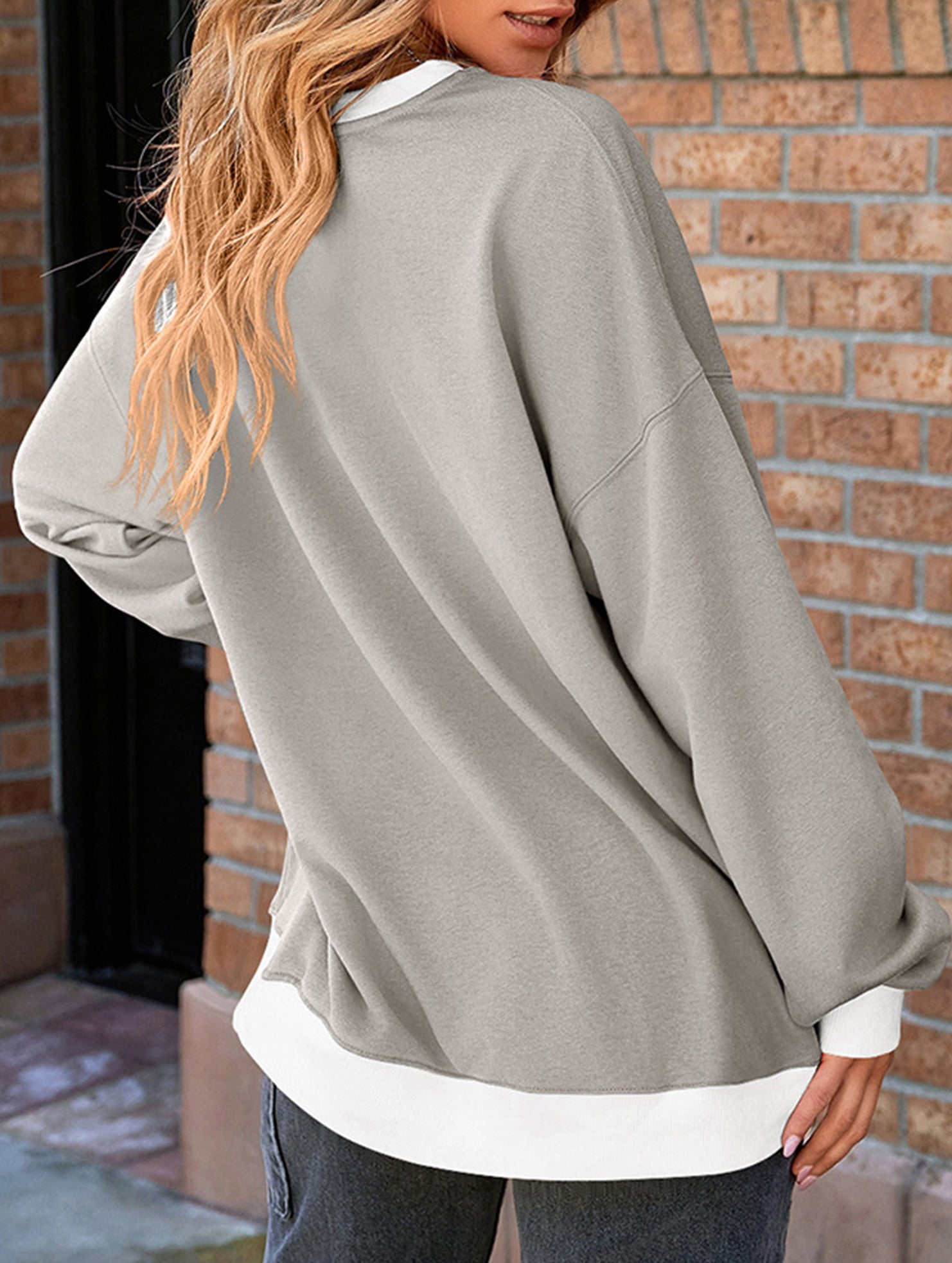 Contrast color splicing round neck sweater