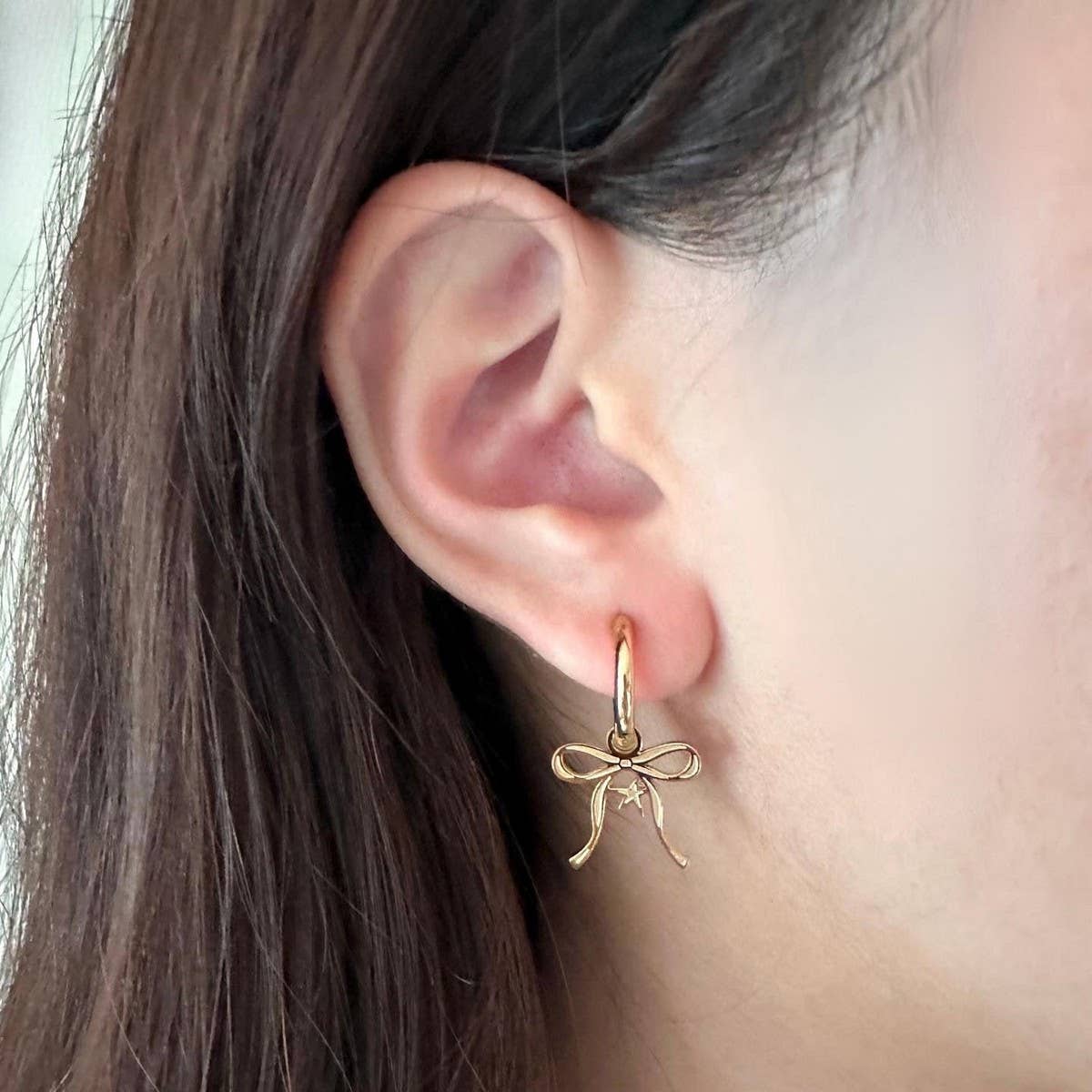 DOUBLE SIDED OIL DRIP STAR BOW EARRINGS_CWAJE5042