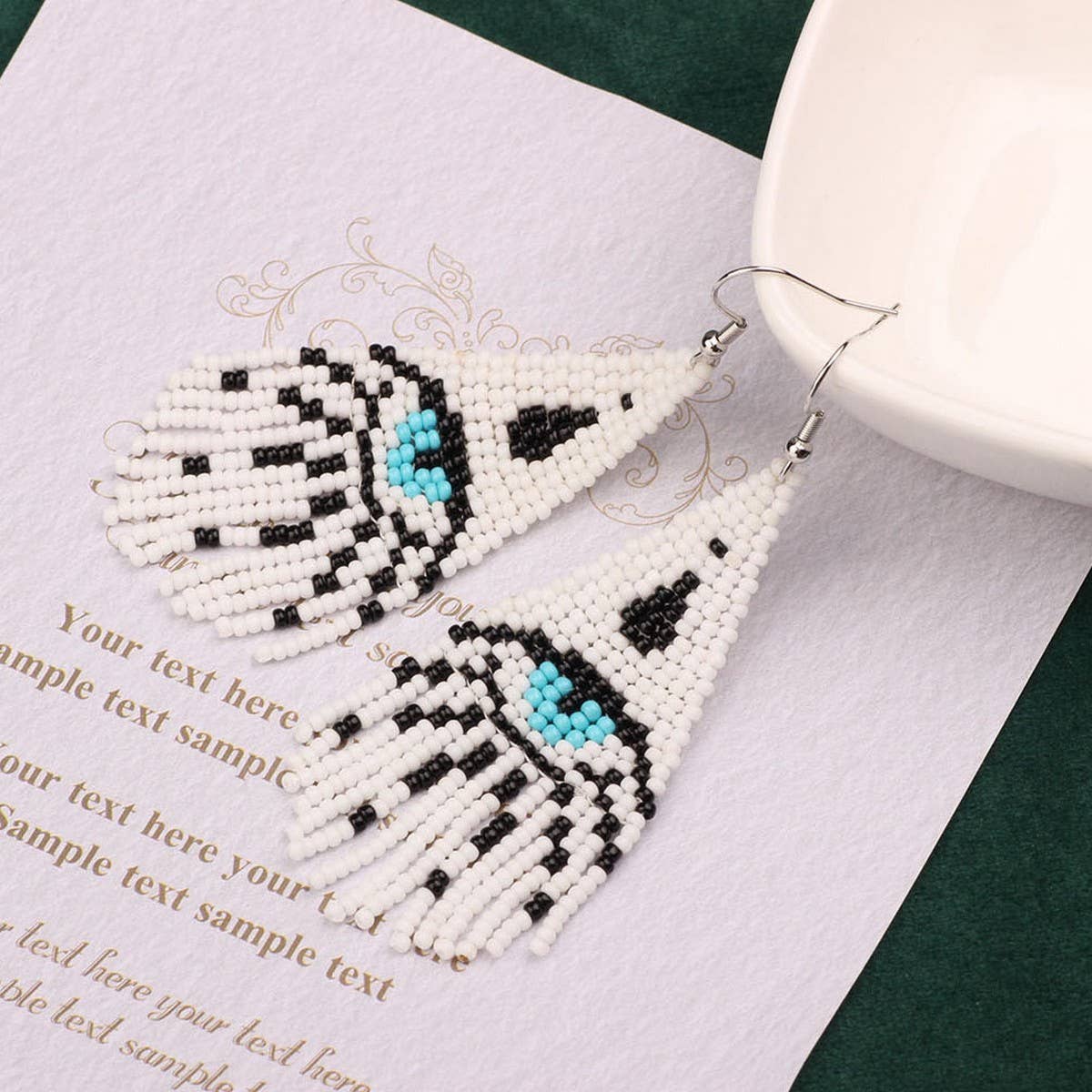 Western Devils Eye Braided Tassel Earrings