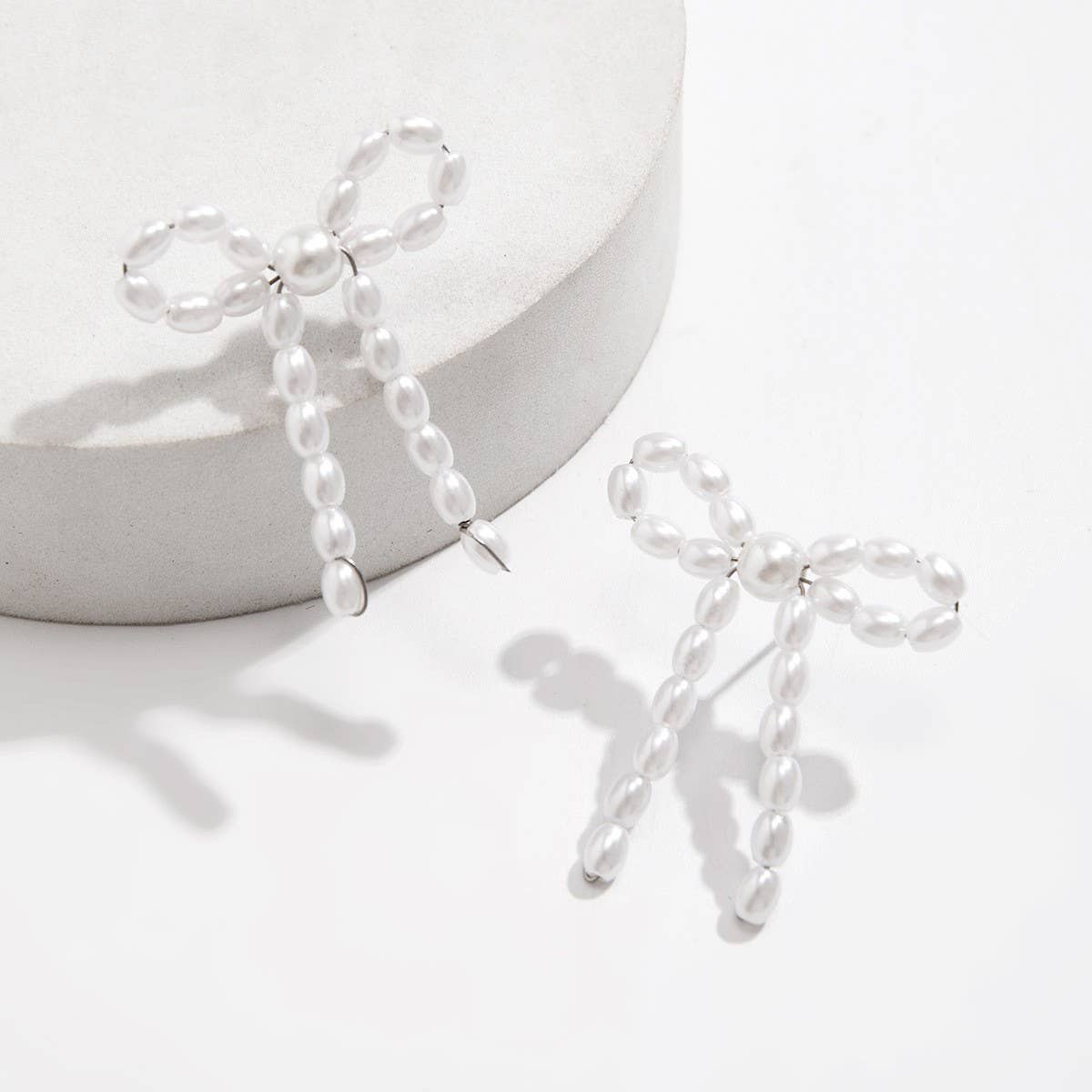 BOW FRENCH TASSEL PEARL EARRINGS_CWAJE1156