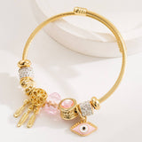 GOLD EVIL EYE CHARM STAINLESS STEEL BRACELET_CWMM8504