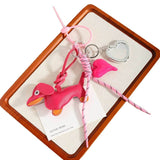 RETRO SAUSAGE DOG KEYCHAIN WITH CLIMBING ROPE_CWMM7738