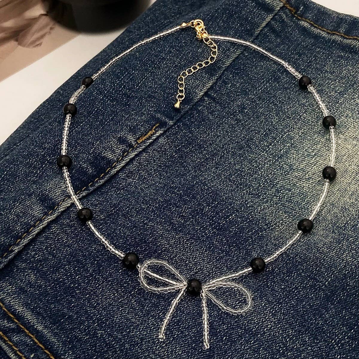 ELEGANT AND FRESH BOW BEADED PEARL NECKLACE_CWAJE3057