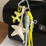STARFISH BALLOON DOG KEYCHAIN WITH TASSEL_CWMM7567