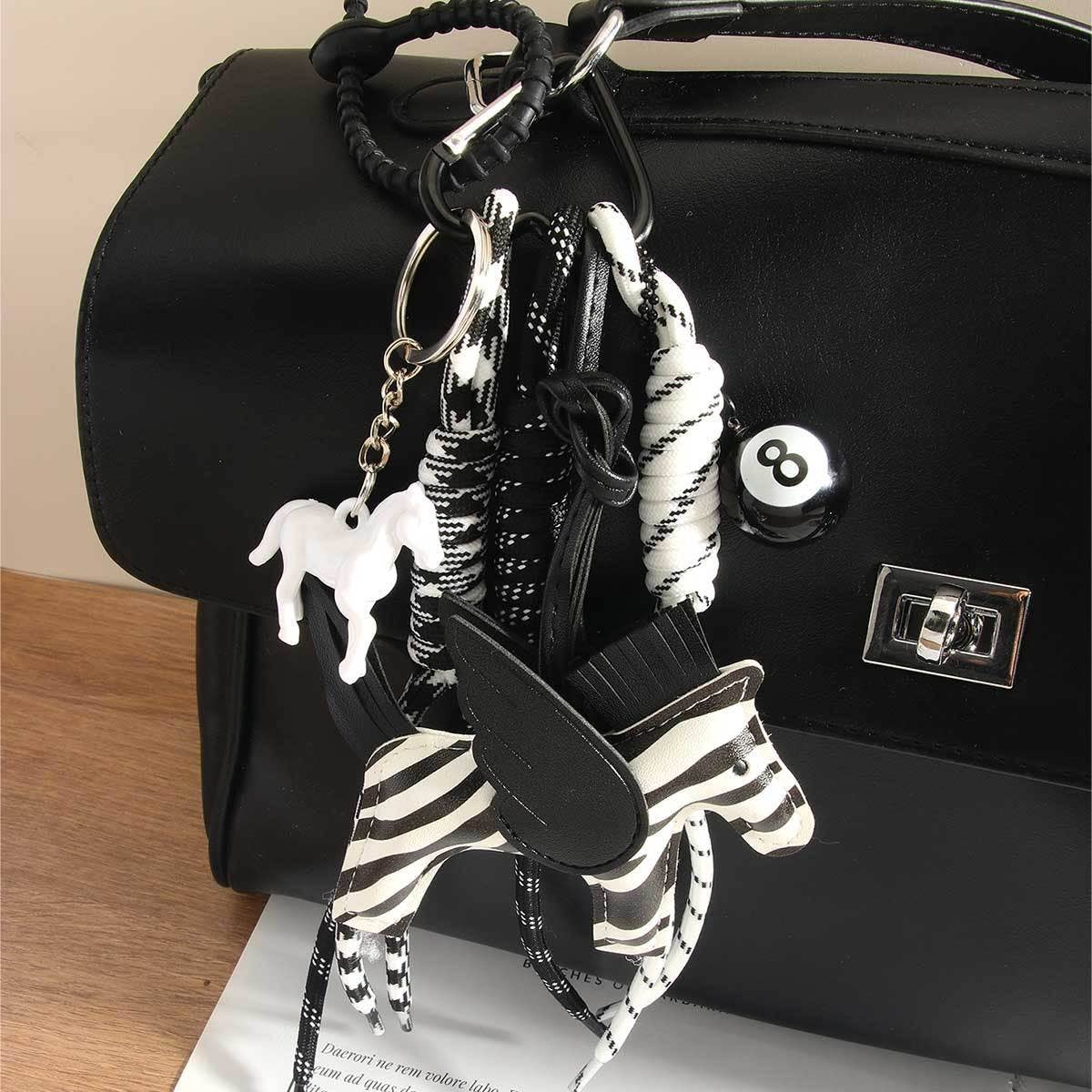 CUTE LEATHER PEGASUS CHARM WITH BRAIDED STRAP_CWMM7559
