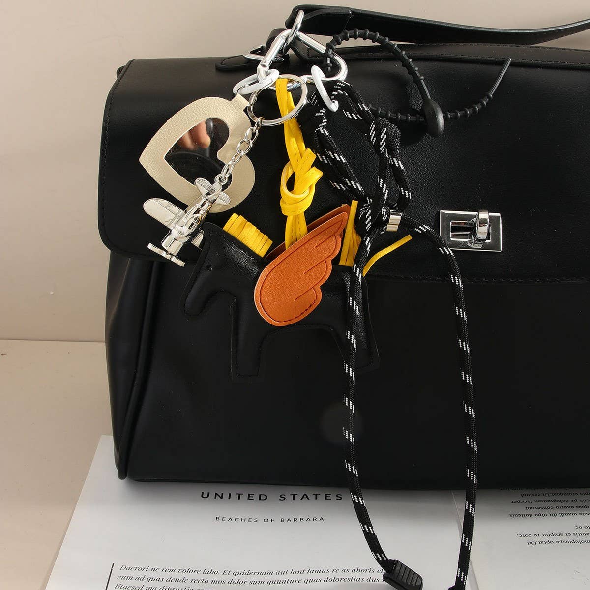 LEATHER PEGASUS PLANE LETTER BAG CHARM_CWMM7566