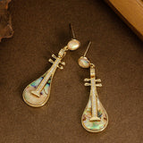 DIAMOND ENCRUSTED ABALONE PIPA PENDANT EARRINGS_CWMM4286