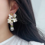 LIVELY AND PURE WATER DROP TASSEL EARRINGS_CWAJE1694