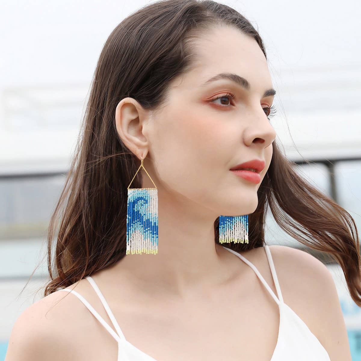 RESORT STYLE BEADED WAVY TASSEL PEARL EARRINGS_CWAJE1652