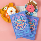 COLORFUL PORTABLE NOTEBOOK ON BLUE BACKGROUND_CWMM1860