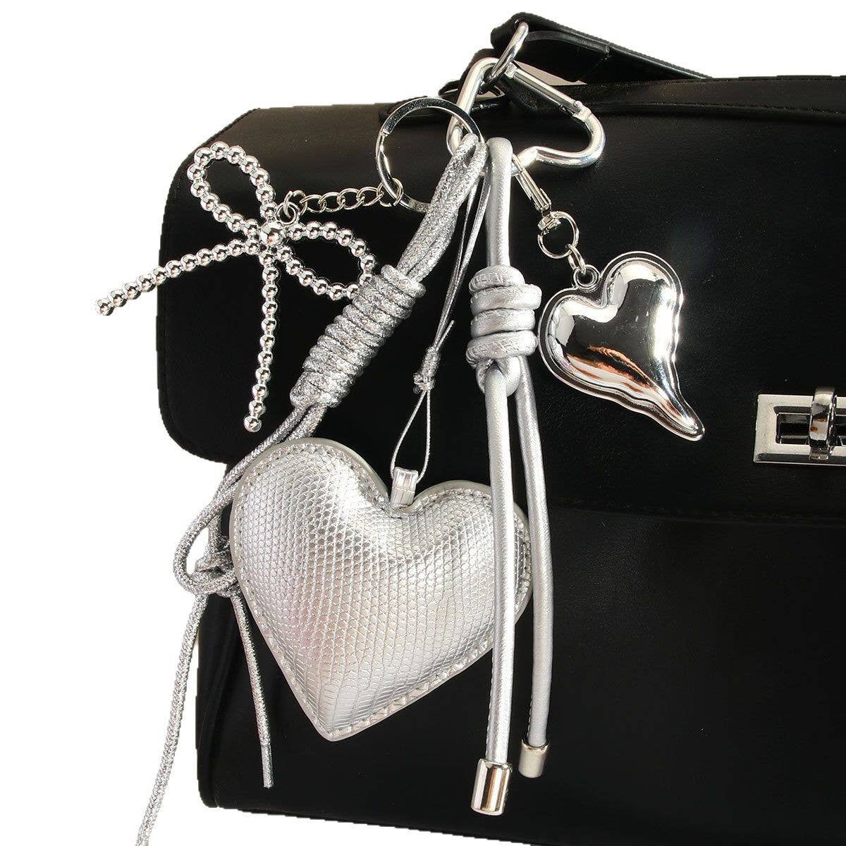 ELEGANT SILVER HEART BOW BAG KEYCHAIN_CWMM7640