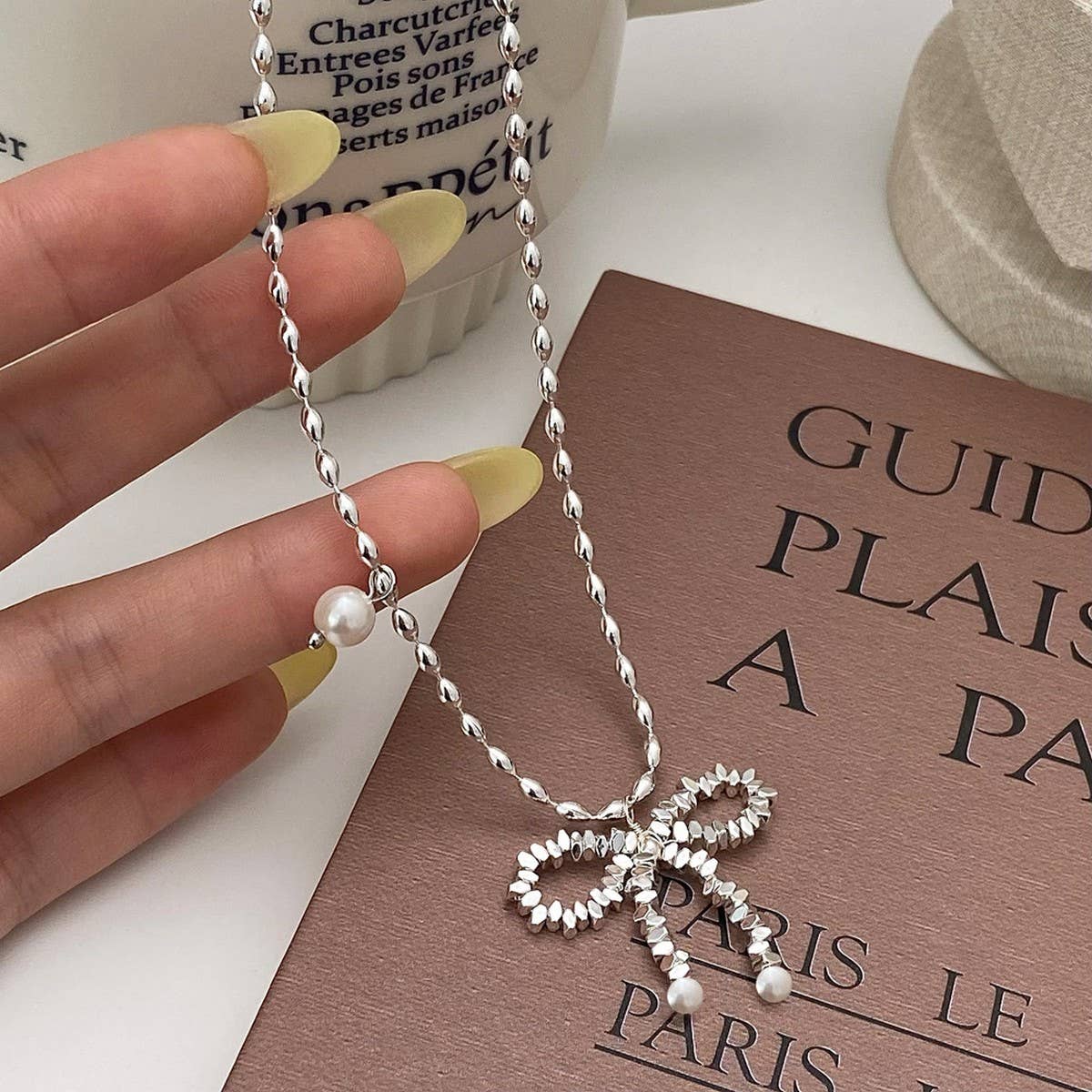 Womens Pearl And Silver Bow Pendant Necklace