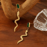 18K GOLD SNAKE SHAPED EARRINGS WITH DIAMONDS_CWMM3650
