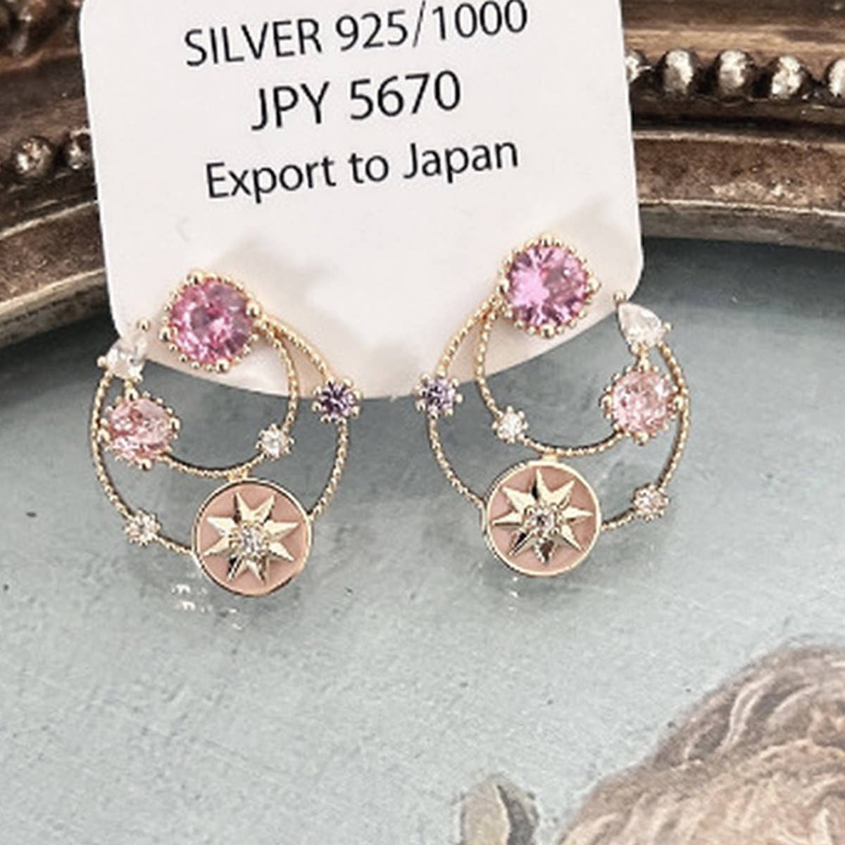 HOLLOW ZIRCON STAR EARRINGS_CWAJE1316