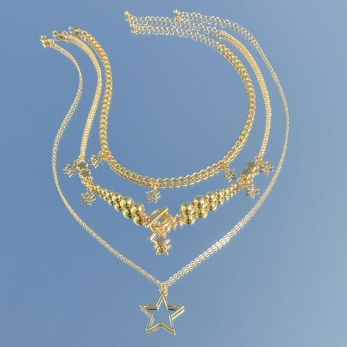 BEADED NECKLACE WITH STAR SHAPED PENDANT TASSELS_CWAJE1158