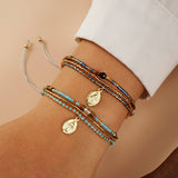 RICE BEAD HAND WOVEN MULTI LAYERED BRACELET_CWAB4633