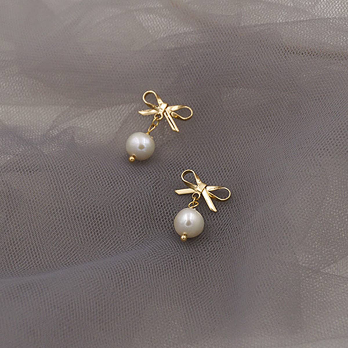 FASHIONABLE AND VERSATILE BOW PEARL EARRINGS_CWAJE1681