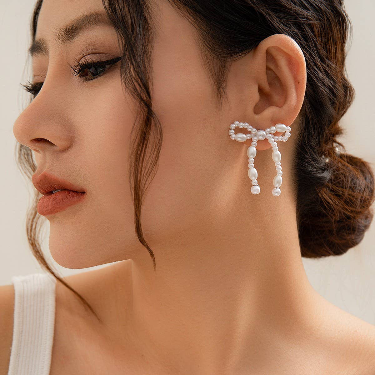 BOW FRENCH TASSEL PEARL EARRINGS_CWAJE1156