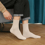 SOLID COLOR MASSAGE BOTTOM CASUAL MID CALF SOCKS_CWMS0993