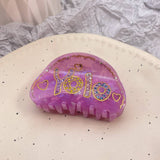 HAIR CLAW CLIP WITH YOLO LETTERS AND RHINESTONES_CWASC1604